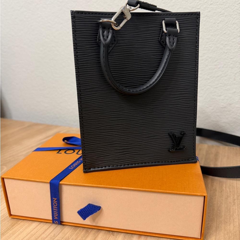 Louis Vuitton Petite Sac Plat Epi Leather - Perfect Condition (never worn).

A